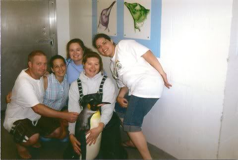 Jon, Julie, Emily, and me with Fisher and the lady who works at Sea World
