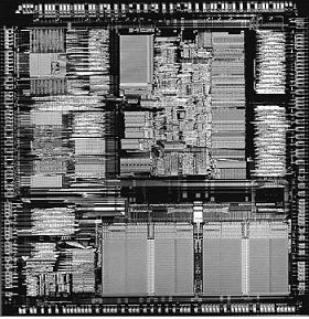 386 processor die. Photograph used by permission of Intel Corporation