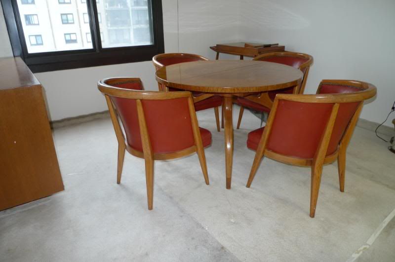 An entire mid-century dining set for $800 includes this dining table and chairs...